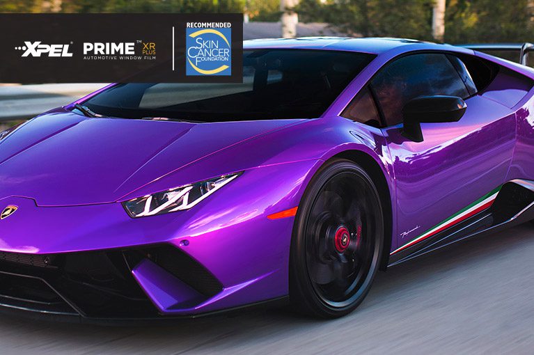 Purple sports car with tinted windows.